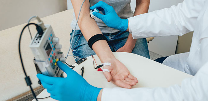 Patient receiving neuropathy treatment in Bakersfield for neuropathy relief